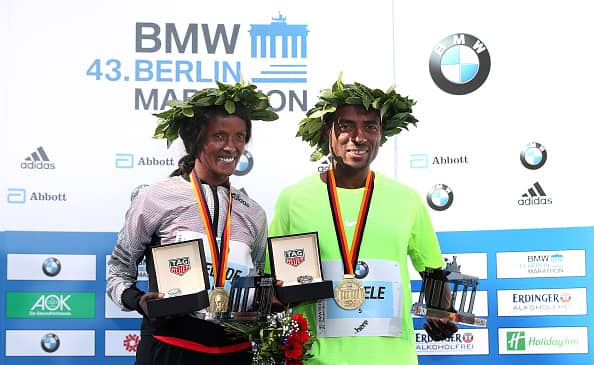 Bekele with his marathon running medal